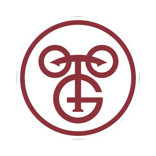 Maroon monogram with two looped strokes above a G-like letterform, enclosed in a thin circular ring.