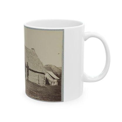 A Group Of Soldiers, And Two Young Men, One An African American, Stand Outside Of Log Cabin Quarters (U.S. Civil War) White Coffee Mug