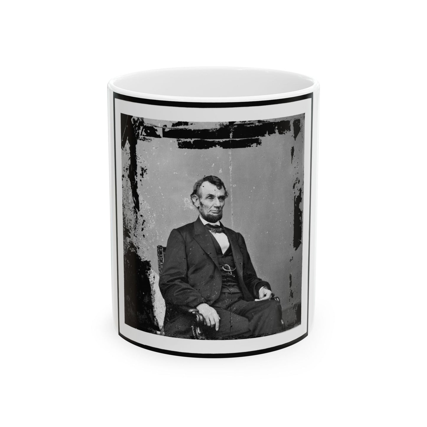 Abraham Lincoln, President Of The United States, Three-Quarter Length Portrait, Seated, Facing Right (U.S. Civil War) White Coffee Mug