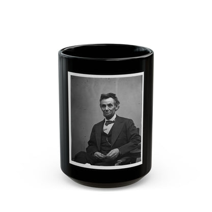 Abraham Lincoln, Three-Quarter Length Portrait, Seated And Holding His Spectacles And A Pencil (U.S. Civil War) Black Coffee Mug