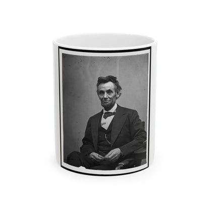 Abraham Lincoln, Three-Quarter Length Portrait, Seated And Holding His Spectacles And A Pencil (U.S. Civil War) White Coffee Mug