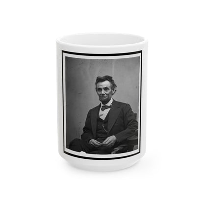 Abraham Lincoln, Three-Quarter Length Portrait, Seated And Holding His Spectacles And A Pencil (U.S. Civil War) White Coffee Mug