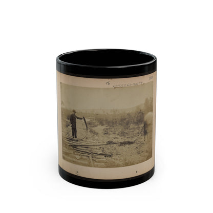 Military Railroad Operations In Northern Virginia Man Standing On Railroad Tracks Holding Twisted Rail (U.S. Civil War) Black Coffee Mug-11oz-The Sticker Space