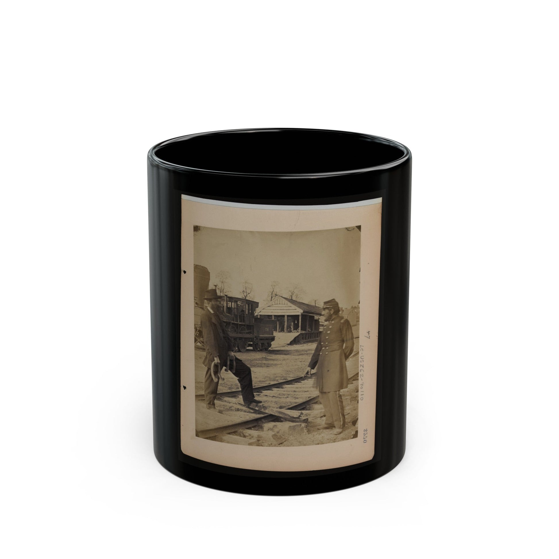 Military Railroad Operations In Northern Virginia Soldier And Another Man Standing At Railroad Tracks In Front Of Locomotive (U.S. Civil War) Black Coffee Mug-11oz-The Sticker Space