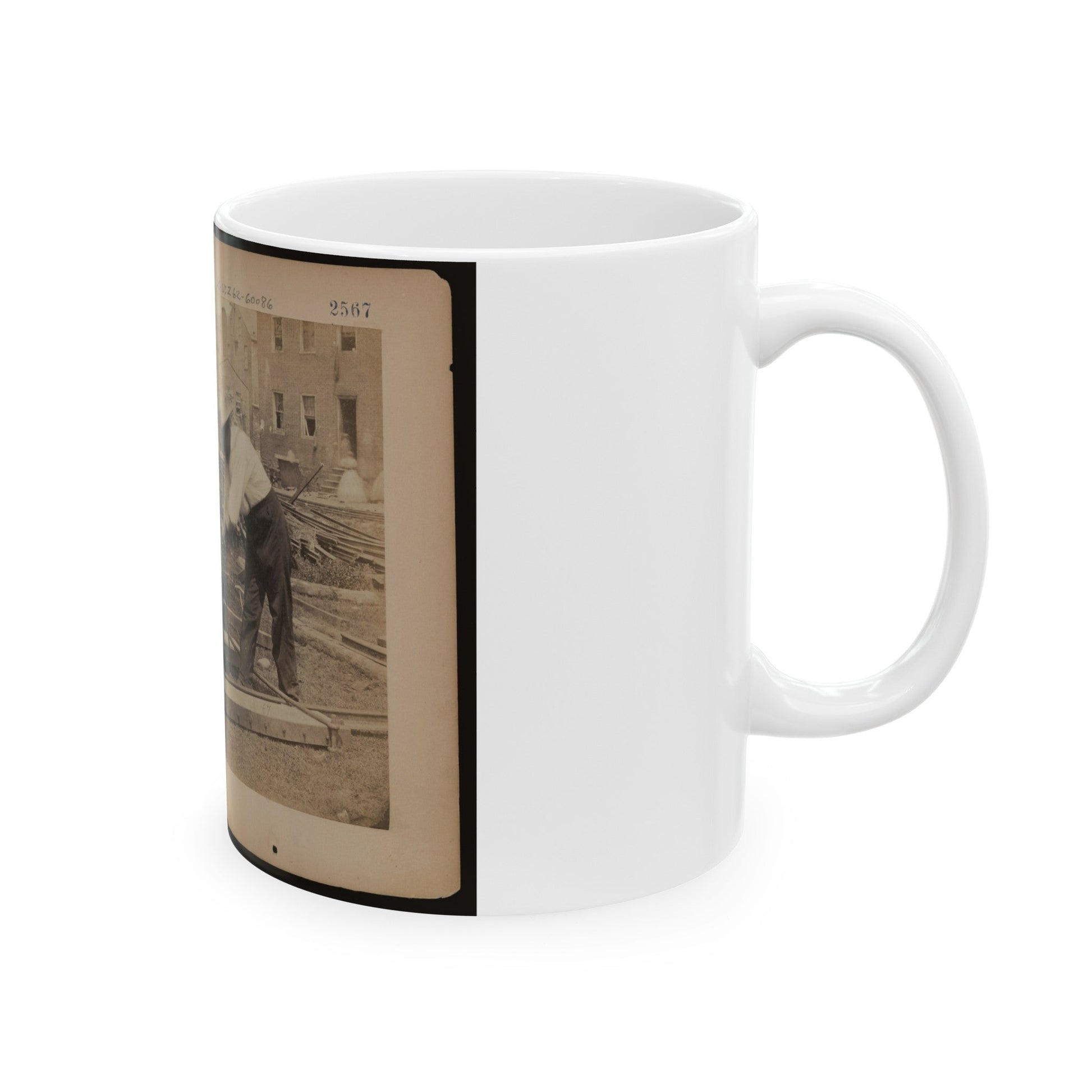 Railroad Construction Worker Straightening Track; Pile Of Twisted Rails In Background. 1862-63 (U.S. Civil War) White Coffee Mug-The Sticker Space