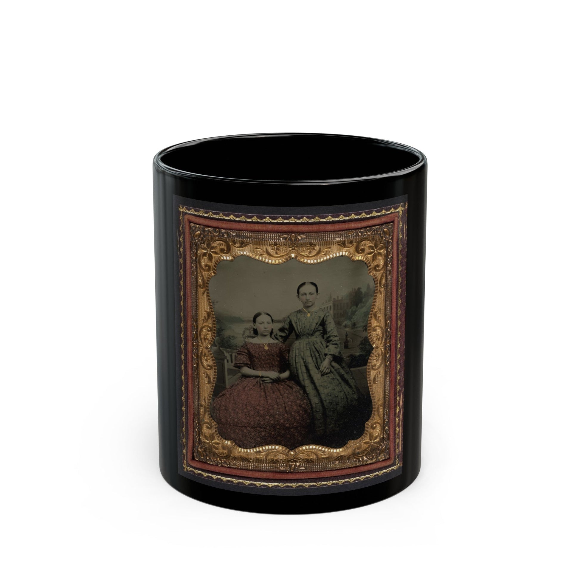 Two Unidentified Young Women Wearing Printed Dresses And Necklaces In Front Of Painted Backdrop Showing Plantation (U.S. Civil War) Black Coffee Mug-11oz-The Sticker Space