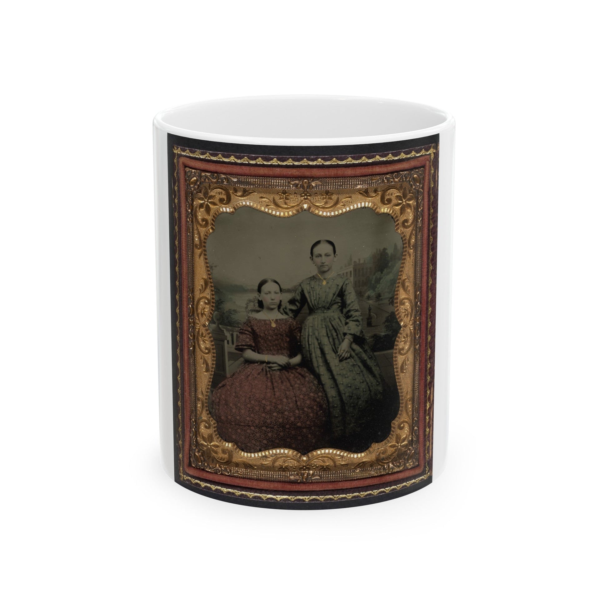 Two Unidentified Young Women Wearing Printed Dresses And Necklaces In Front Of Painted Backdrop Showing Plantation (U.S. Civil War) White Coffee Mug-11oz-The Sticker Space