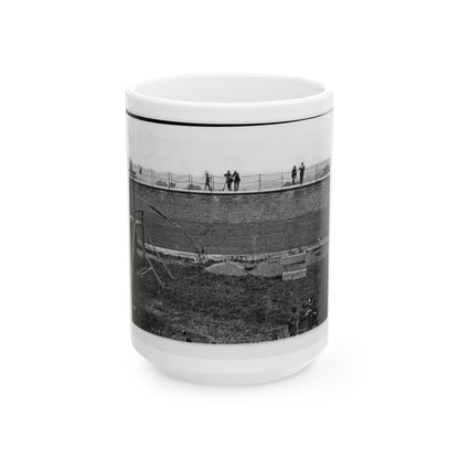 Washington, D.C. Coffins And Open Graves Ready For The Conspirators' Bodies At Right Of Scaffold (U.S. Civil War) White Coffee Mug-15oz-The Sticker Space